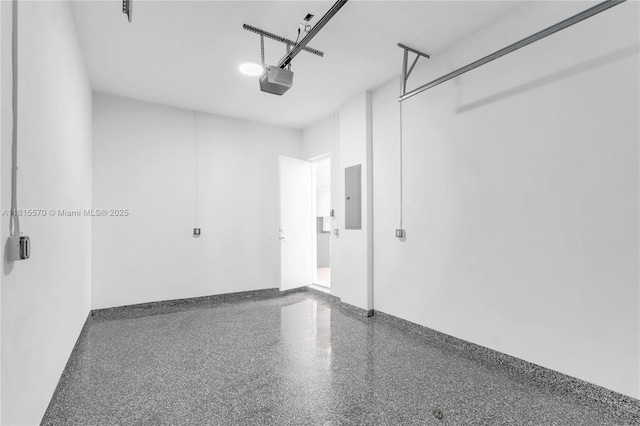 3122 Carter St, Miami, FL 33133 - garage featuring electric panel and a garage door opener