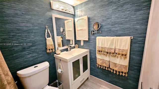 1401 SW 134th Way Unit 412C, Pembroke Pines, FL 33027 - bathroom featuring wood finished floors and vanity