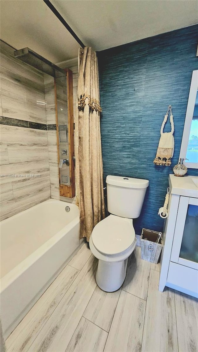 1401 SW 134th Way Unit 412C, Pembroke Pines, FL 33027 - full bath with shower / tub combo, wood finished floors, and vanity