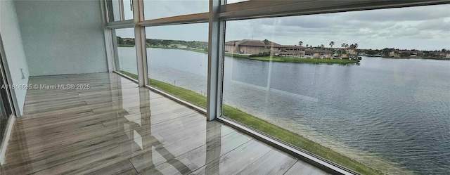 1401 SW 134th Way Unit 412C, Pembroke Pines, FL 33027 - unfurnished sunroom featuring a water view