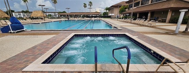 1401 SW 134th Way Unit 412C, Pembroke Pines, FL 33027 - community pool featuring a patio area