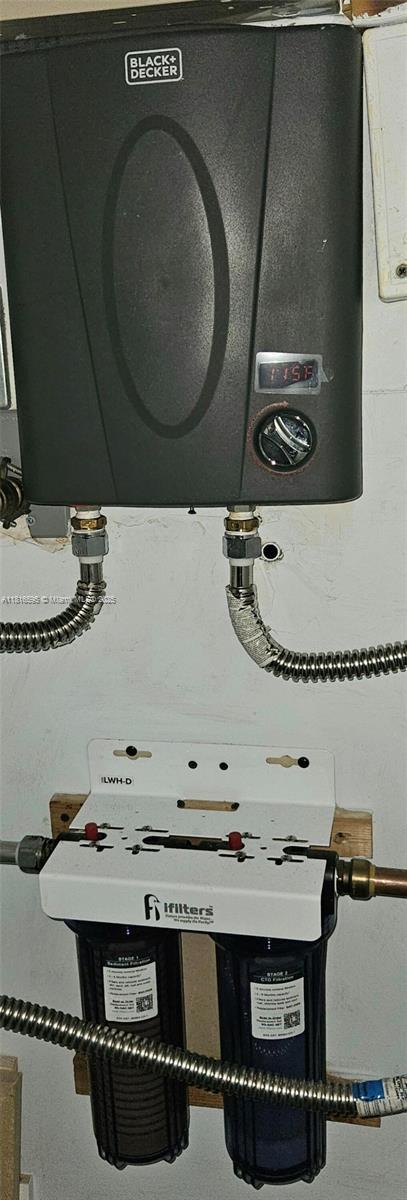 1401 SW 134th Way Unit 412C, Pembroke Pines, FL 33027 - detailed view of water heater