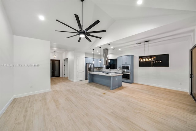 4308 3rd St SW, Lehigh Acres, FL 33976 - kitchen with stainless steel appliances, island exhaust hood, open floor plan, a ceiling fan, and recessed lighting