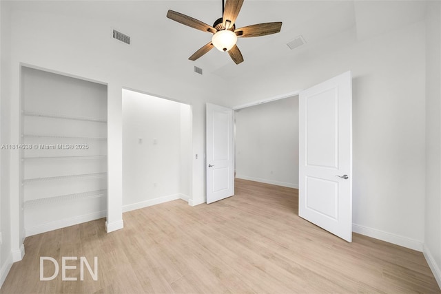 4308 3rd St SW, Lehigh Acres, FL 33976 - unfurnished bedroom featuring light wood finished floors, baseboards, a closet, and a ceiling fan