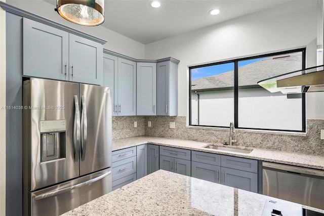 4308 3rd St SW, Lehigh Acres, FL 33976 - kitchen featuring stainless steel appliances, a sink, gray cabinets, light stone countertops, and recessed lighting