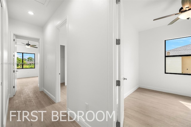 4308 3rd St SW, Lehigh Acres, FL 33976 - hall featuring light wood-type flooring, baseboards, and recessed lighting