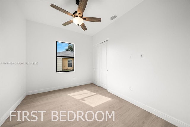 4308 3rd St SW, Lehigh Acres, FL 33976 - unfurnished bedroom featuring light wood-type flooring, baseboards, and a ceiling fan