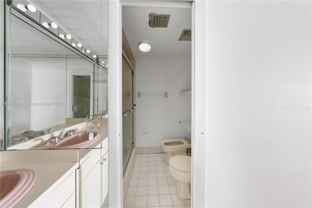 995 SW 84th Ave Unit 126, Miami, FL 33144 - bathroom with a bidet, tile patterned flooring, vanity, toilet, and a stall shower