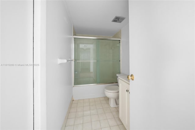 995 SW 84th Ave Unit 126, Miami, FL 33144 - full bathroom with toilet, tile patterned flooring, enclosed tub / shower combo, and vanity