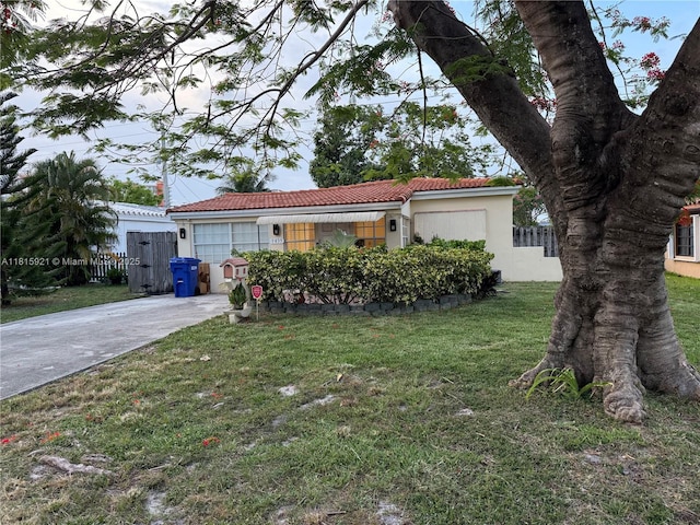 1435 NE 182nd St, North Miami Beach, FL 33162 - view of front of property featuring stucco siding and a tiled roof