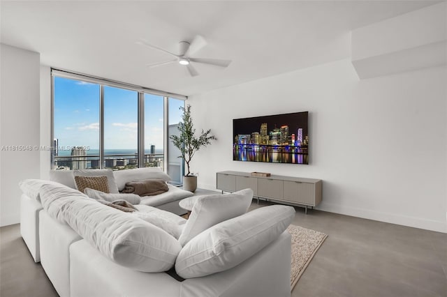 92 SW 3rd St Unit 5204, Miami, FL 33130 - living area with a wall of windows, ceiling fan, concrete floors, and baseboards