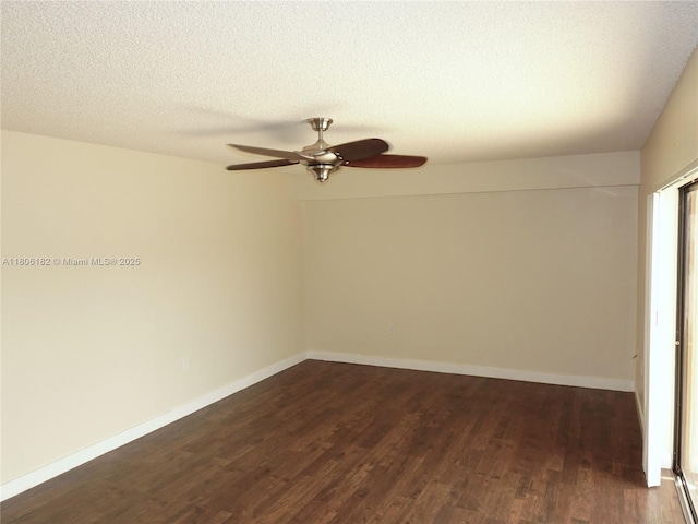 4226 42nd Way, West Palm Beach, FL 33407 - spare room featuring dark wood-style floors, a ceiling fan, a textured ceiling, and baseboards