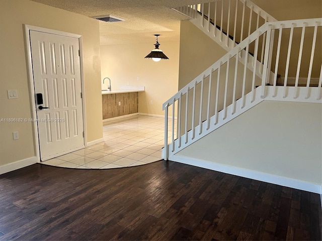 4226 42nd Way, West Palm Beach, FL 33407 - stairs featuring wood finished floors and baseboards