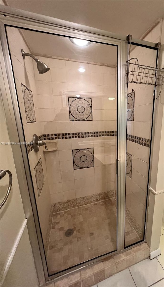 4226 42nd Way, West Palm Beach, FL 33407 - bathroom featuring a stall shower and tile patterned floors