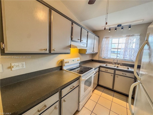 2016 Mariner Ct, La Belle, FL 33935 - kitchen with white appliances, a sink, under cabinet range hood, dark countertops, and light tile patterned flooring