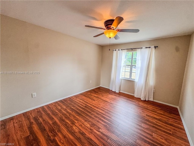 2016 Mariner Ct, La Belle, FL 33935 - unfurnished room with wood finished floors, a ceiling fan, and baseboards