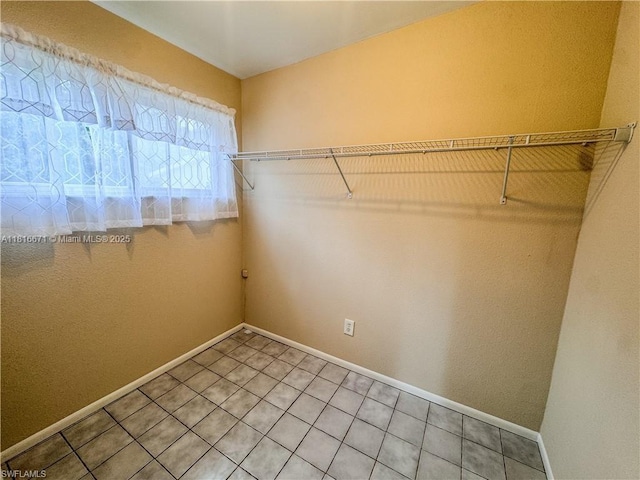 2016 Mariner Ct, La Belle, FL 33935 - walk in closet with tile patterned flooring