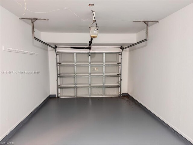 2016 Mariner Ct, La Belle, FL 33935 - garage with baseboards