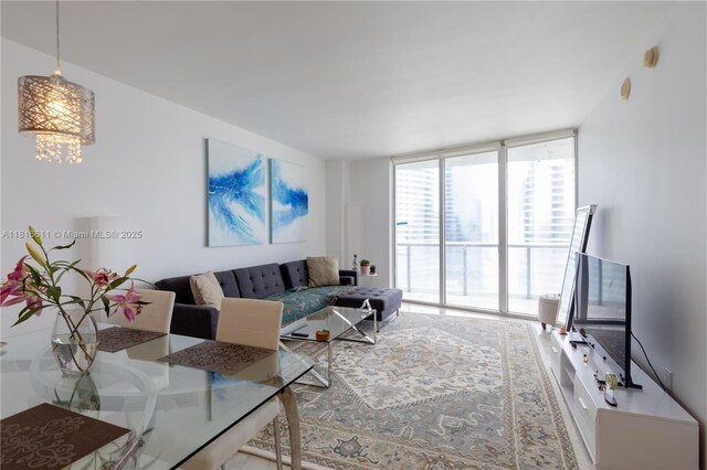 475 Brickell Ave Unit 3512, Miami, FL 33131 - living room with expansive windows and a chandelier