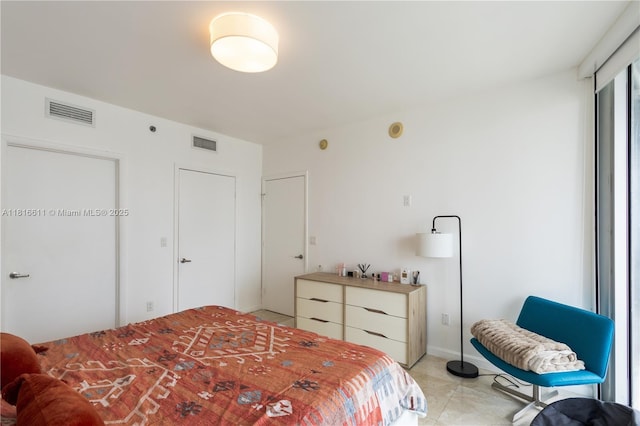 475 Brickell Ave Unit 3512, Miami, FL 33131 - bedroom with light tile patterned floors