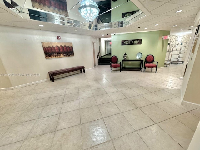 1100 Saint Charles Pl Unit 712, Pembroke Pines, FL 33026 - common area featuring recessed lighting, a drop ceiling, and stairs
