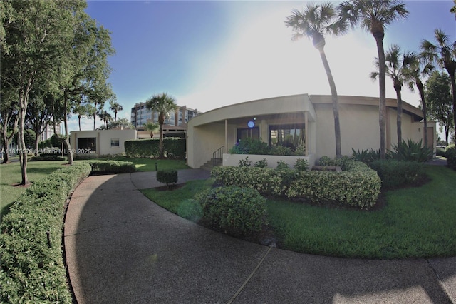 1100 Saint Charles Pl Unit 712, Pembroke Pines, FL 33026 - surrounding community featuring a lawn