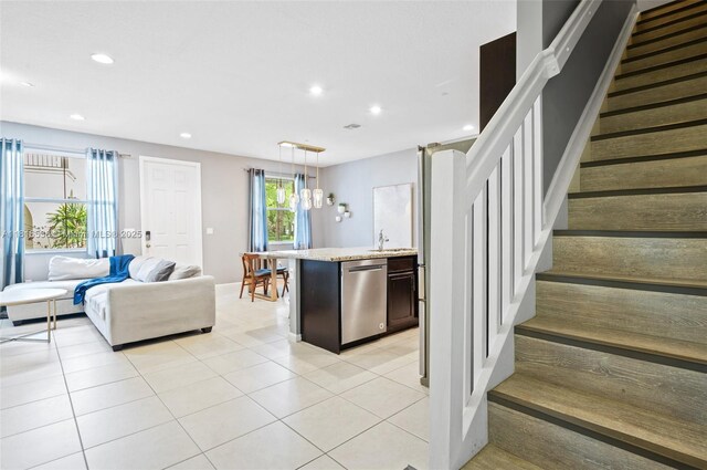 4164 Cascada Cir, Cooper City, FL 33024 - living room featuring stairway, recessed lighting, light tile patterned flooring, and baseboards