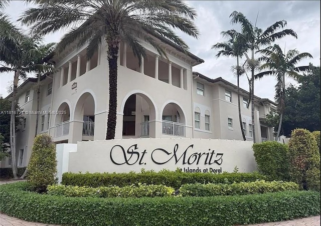 11603 NW 89th St Unit 214, Doral, FL 33178 - view of community / neighborhood sign