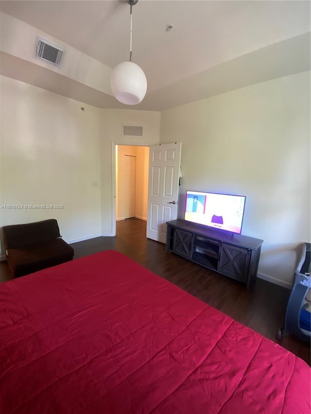 11603 NW 89th St Unit 214, Doral, FL 33178 - bedroom with wood finished floors and baseboards