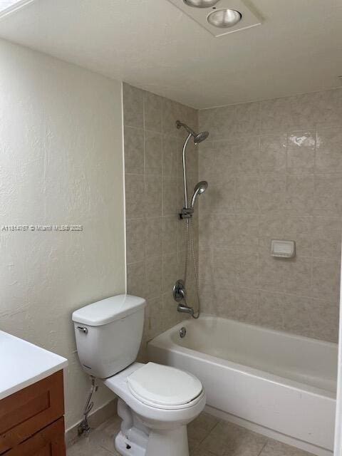 2751 N Palm Aire Dr Unit 504, Pompano Beach, FL 33069 - full bathroom with toilet, vanity, tile patterned floors, and  shower combination