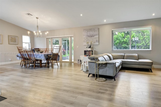 4760 SW 57th Ave, Davie, FL 33314 - living room featuring a chandelier, light wood-style floors, baseboards, vaulted ceiling, and recessed lighting