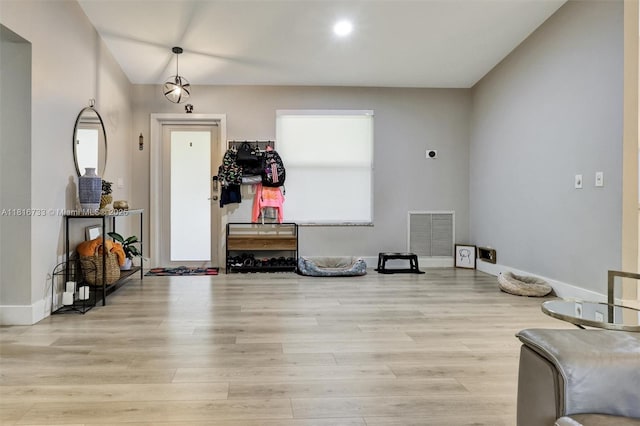 4760 SW 57th Ave, Davie, FL 33314 - foyer with baseboards and light wood-style flooring