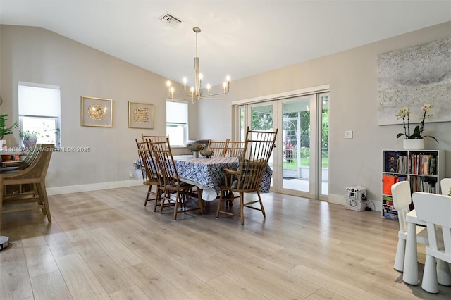 4760 SW 57th Ave, Davie, FL 33314 - dining area with a chandelier, light wood finished floors, lofted ceiling, baseboards, and french doors