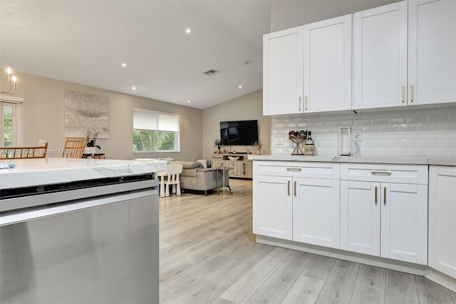 4760 SW 57th Ave, Davie, FL 33314 - kitchen with dishwasher, plenty of natural light, tasteful backsplash, vaulted ceiling, and recessed lighting