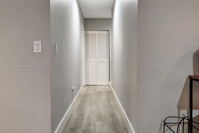4760 SW 57th Ave, Davie, FL 33314 - corridor with light wood finished floors and baseboards