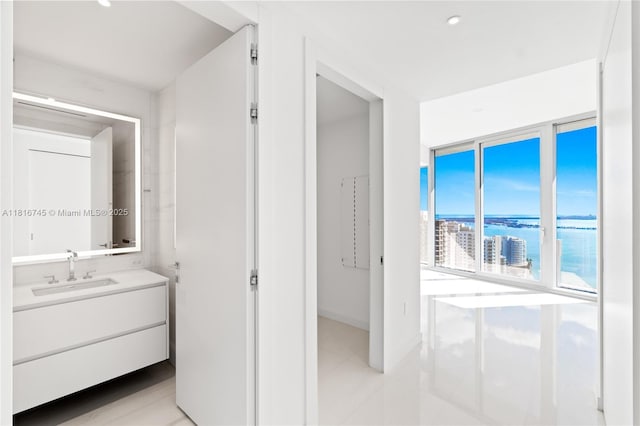 300 Biscayne Blvd Way Unit 3506, Miami, FL 33131 - hall with a sink, a water view, recessed lighting, and light tile patterned flooring