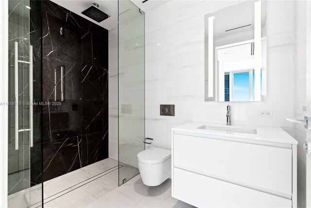 300 Biscayne Blvd Way Unit 3506, Miami, FL 33131 - full bathroom featuring toilet, vanity, tile walls, and a marble finish shower