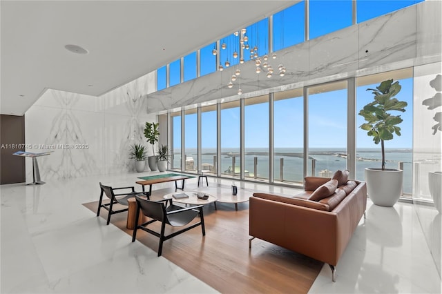 300 Biscayne Blvd Way Unit 3506, Miami, FL 33131 - living room with a towering ceiling, a wall of windows, and a water view
