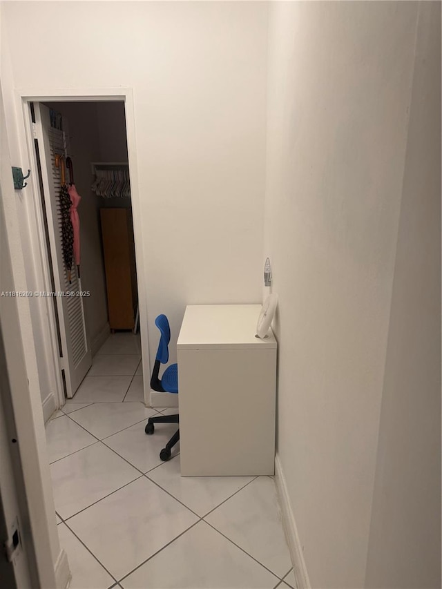 5161 Collins Ave Unit 216, Miami Beach, FL 33140 - home office featuring light tile patterned floors and baseboards