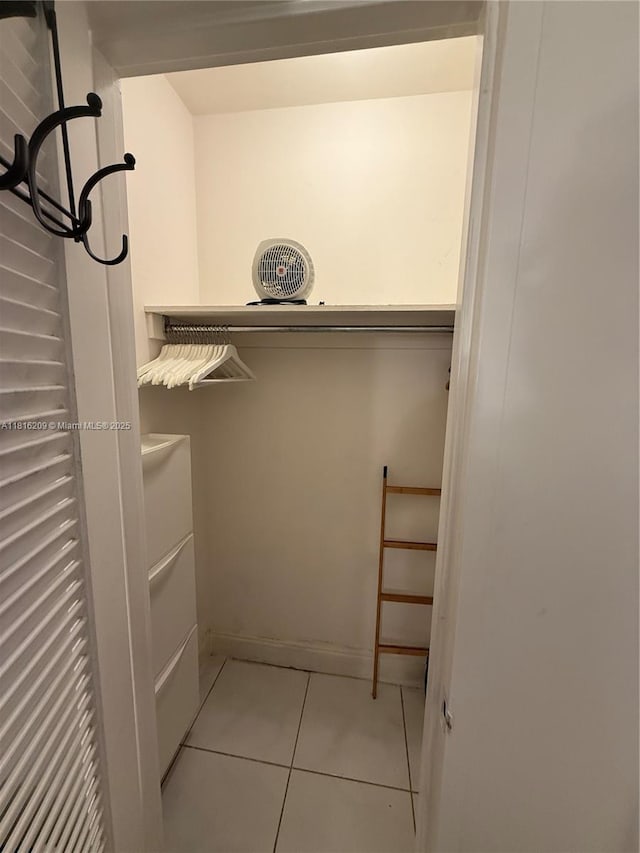 5161 Collins Ave Unit 216, Miami Beach, FL 33140 - walk in closet with tile patterned flooring