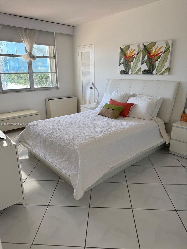 5161 Collins Ave Unit 216, Miami Beach, FL 33140 - bedroom featuring light tile patterned flooring