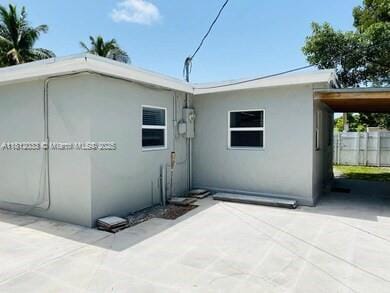 804 N 20th Ct, Hollywood, FL 33020 - rear view of house with stucco siding