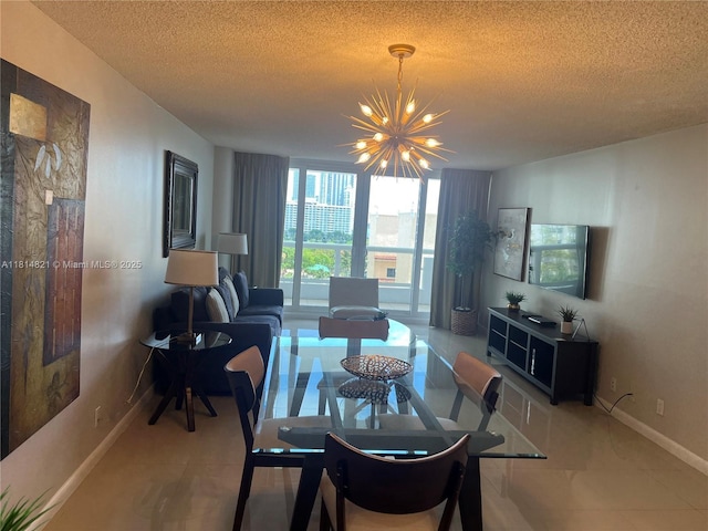 1717 N Bayshore Dr Unit A-1038, Miami, FL 33132 - dining space featuring a chandelier, a textured ceiling, baseboards, and tile patterned flooring