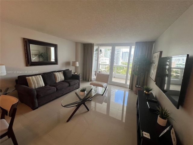 1717 N Bayshore Dr Unit A-1038, Miami, FL 33132 - living room featuring a textured ceiling, tile patterned floors, and expansive windows