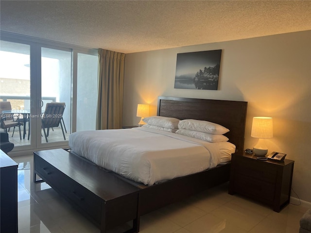 1717 N Bayshore Dr Unit A-1038, Miami, FL 33132 - bedroom featuring access to outside, a textured ceiling, and light tile patterned floors