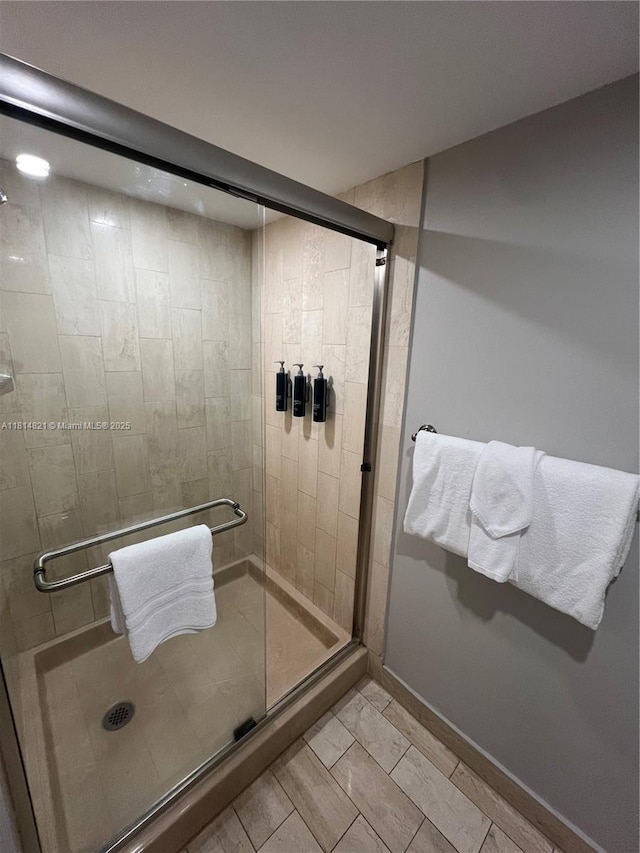 1717 N Bayshore Dr Unit A-1038, Miami, FL 33132 - bathroom with a shower stall and baseboards