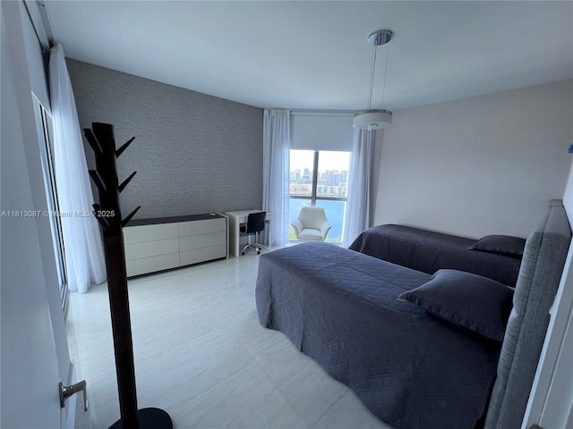 17301 Biscayne Blvd Unit 1402, North Miami Beach, FL 33160 - bedroom with an office area and tile patterned floors