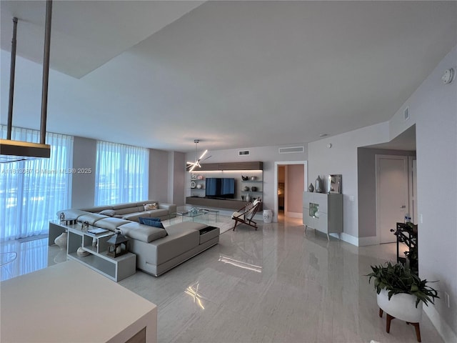 17301 Biscayne Blvd Unit 1402, North Miami Beach, FL 33160 - living area featuring a chandelier