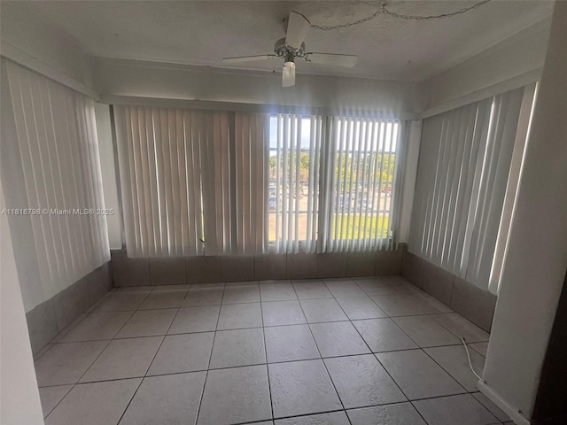 7000 NW 17th St Unit 218, Plantation, FL 33313 - unfurnished sunroom featuring a ceiling fan