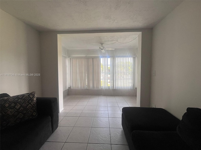 7000 NW 17th St Unit 218, Plantation, FL 33313 - living room with light tile patterned flooring and ceiling fan